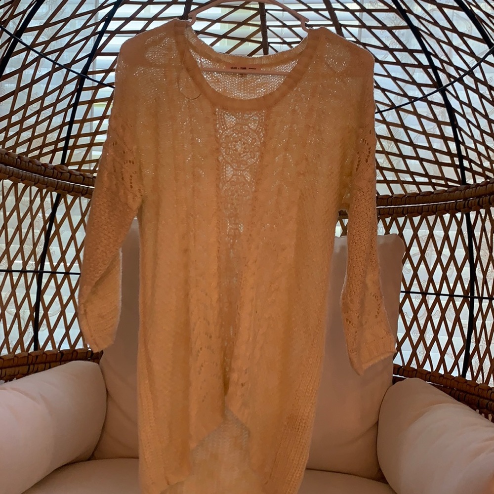 Cream high/low sweater with crochet details